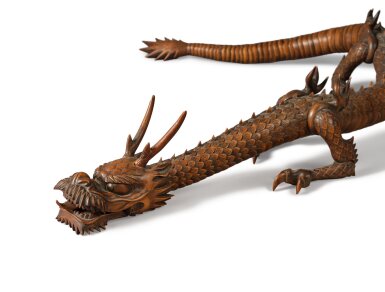 View full screen - View 1 of Lot 612. A Large Boxwood Carved Articulated Model of a Dragon (Jizai Okimono), signed Gyokuzan, Meiji Period, Late 19th Century | 木製龍型自在置物 玉山、明治時代、19世紀後期 | 日本 明治 十九世紀末 黃楊木雕龍形自在置物.