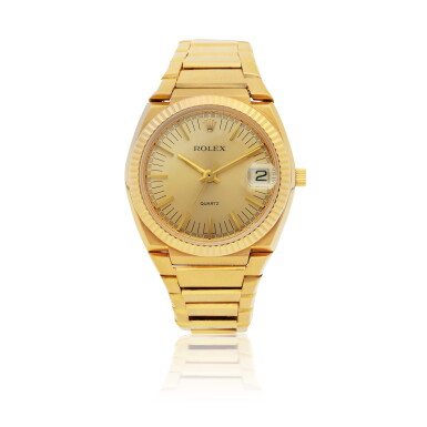 View full screen - View 1 of Lot 7. ROLEX | 'THE TEXAN' QUARTZ, REF 5100 BETA 21 YELLOW GOLD WRISTWATCH WITH DATE AND BRACELET CIRCA 1970.
