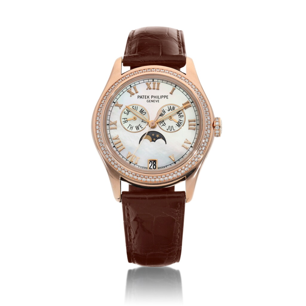 View full screen - View 1 of Lot 8226. Reference 4936 | A pink gold and diamond-set annual calendar wristwatch with moon phases and mother-of-pearl dial, Circa 2011 | 百達翡麗 型號4936 | 粉紅金鑲鑽石年曆腕錶,備月相及珠母貝錶盤,約2011年製.