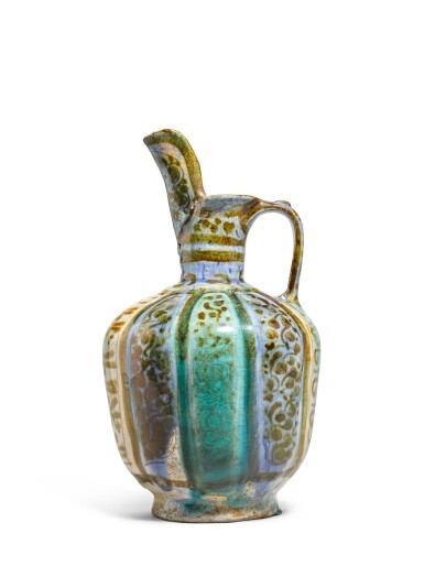 View full screen - View 1 of Lot 178. A small Kashan blue, turquoise and lustre pottery jug, Persia, 13th century.
