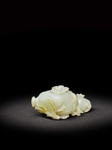 View full screen - View 1 of Lot 7. A celadon jade 'pomegranate' group, Qing dynasty, 18th century | 清十八世紀 青白玉多子多福紋擺件.