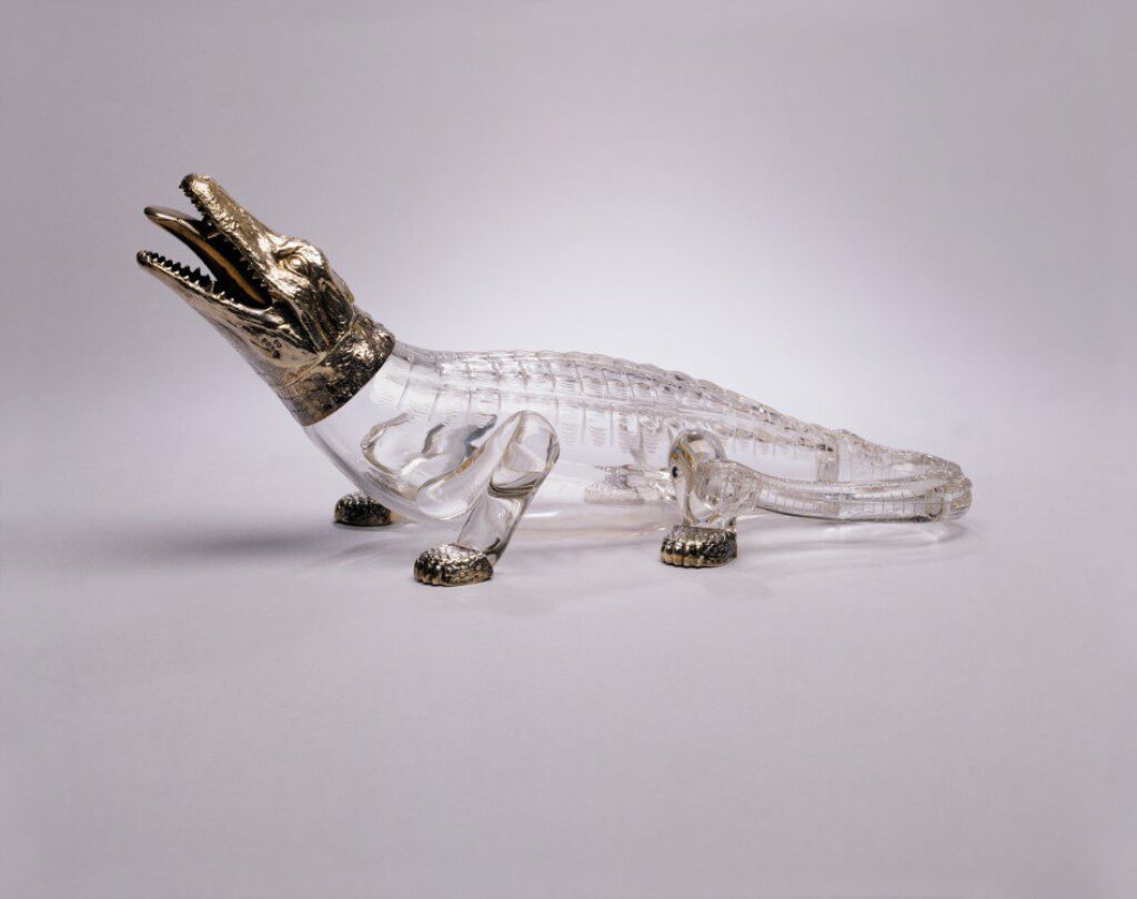 View full screen - View 1 of Lot 326. A Rare Victorian Silver-Mounted Glass "Crocodile" Claret Jug, Sampson Mordon & Co., London, 1884.