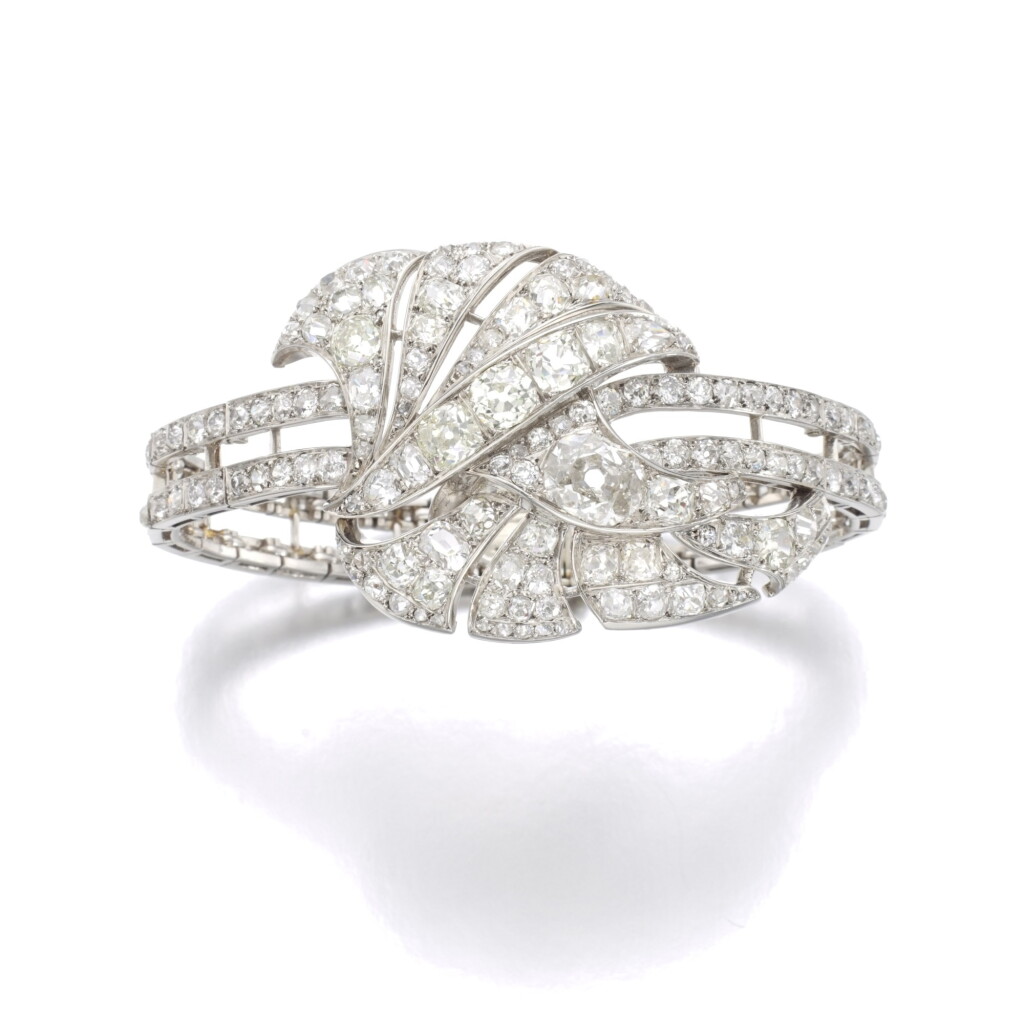 View full screen - View 1 of Lot 570. CHAUMET | DIAMOND BANGLE, 1930S.