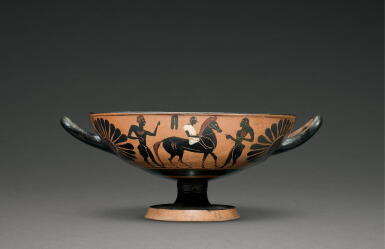 View full screen - View 1 of Lot 215. AN ATTIC BLACK-FIGURE CUP, ATTRIBUTED TO THE GROUP OF COURTING CUPS, FP CLASS, CIRCA 530-520 B.C..