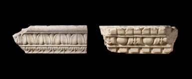 View full screen - View 1 of Lot 131. Two Roman Marble Architectural Relief Fragments, 1st/2nd Century A.D..