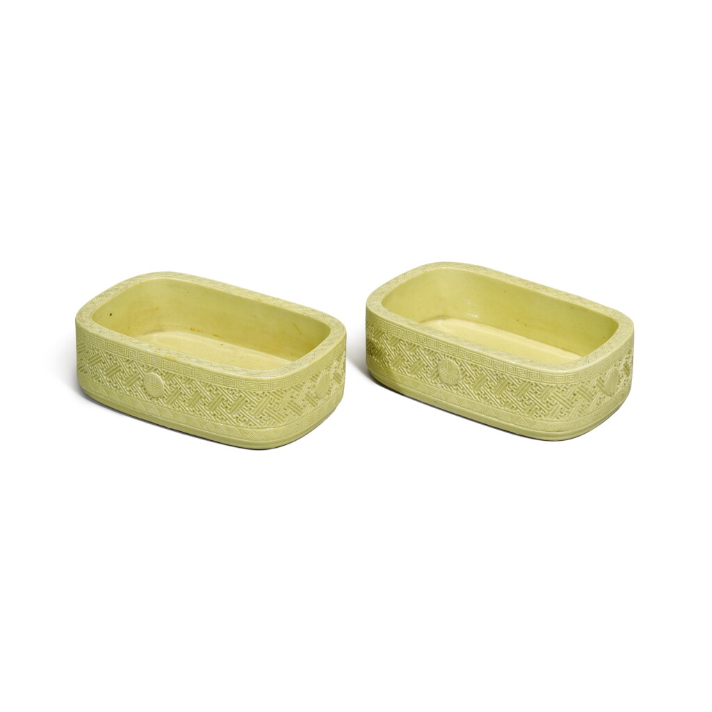 View full screen - View 1 of Lot 308. A pair of moulded yellow-glazed trays, Qing dynasty, 19th century.