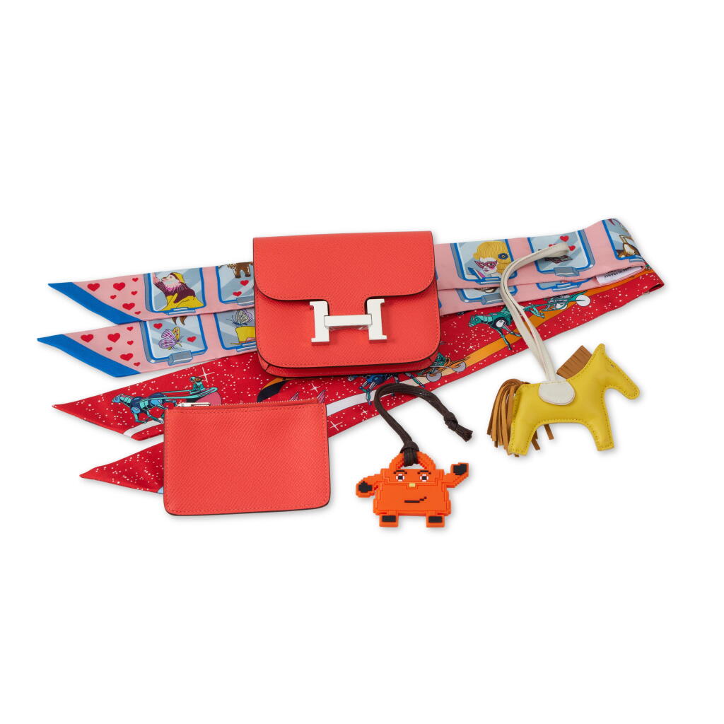 View full screen - View 1 of Lot 62. Set of 5 Orange Field Constance Slim Wallet Palladium Hardware, 2024, Lime, Craie and Sesame Pegase Rodeo PM Charm, 2023, Orange Rubber Jingle Games Kelly Doll Quelle Idole Charm, Rose, Bleu and Jaune Silk Hermès Story Twilly and Rouge, Bleu and Vert Silk Space Derby Twilly.