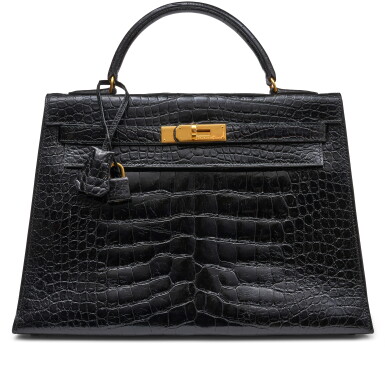 View full screen - View 1 of Lot 1389. Black Shiny Alligator Kelly 32 Gold Hardware, 1980-1990s.