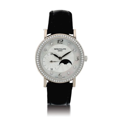 View full screen - View 1 of Lot 108. Reference 4958 Calatrava A white gold and diamond-set wristwatch with moon phases and mother-of-pearl dial, Made in 2008.