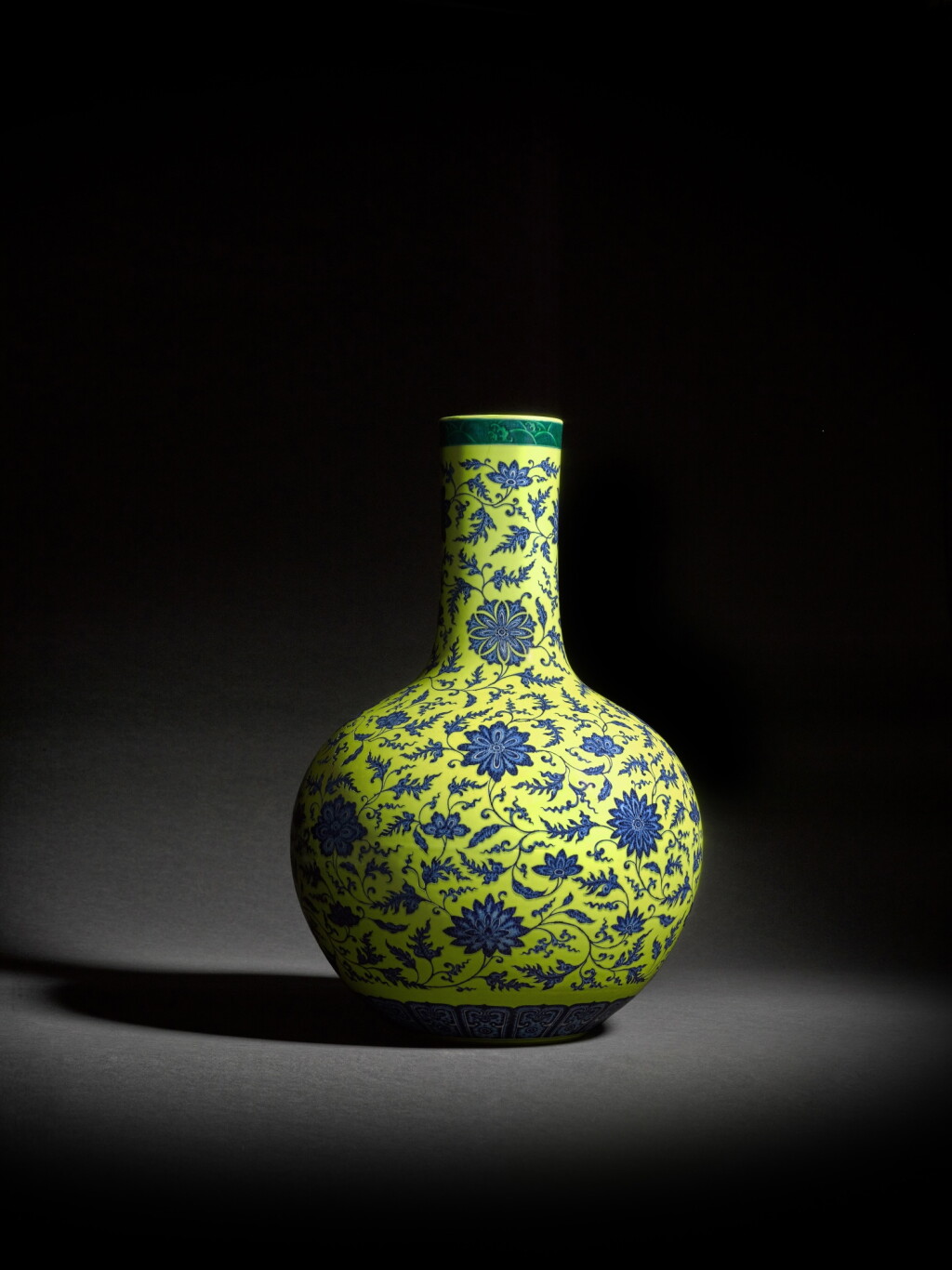 View full screen - View 1 of Lot 41. A magnificent lemon-yellow and underglaze-blue 'lotus' vase (Tianqiuping), Seal mark and period of Qianlong.