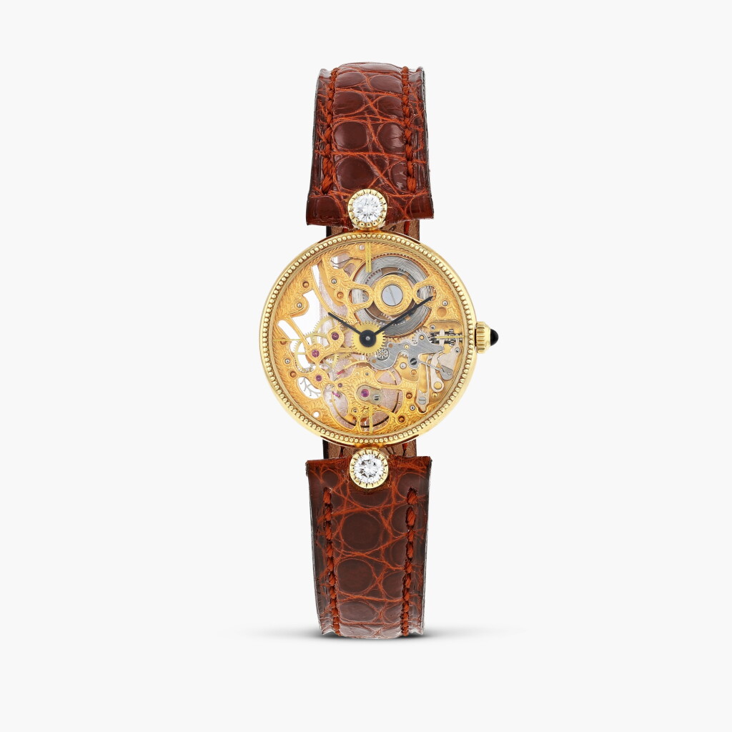 View full screen - View 1 of Lot 424. Classic Skeleton reference 133620-001, yellow gold skeleton wristwatch, set with two diamonds, circa 1985.