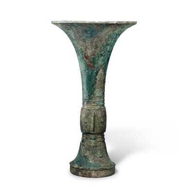 View full screen - View 1 of Lot 241. An archaic bronze ritual wine vessel (Gu), Late Shang dynasty | 商末 青銅饕餮紋觚.