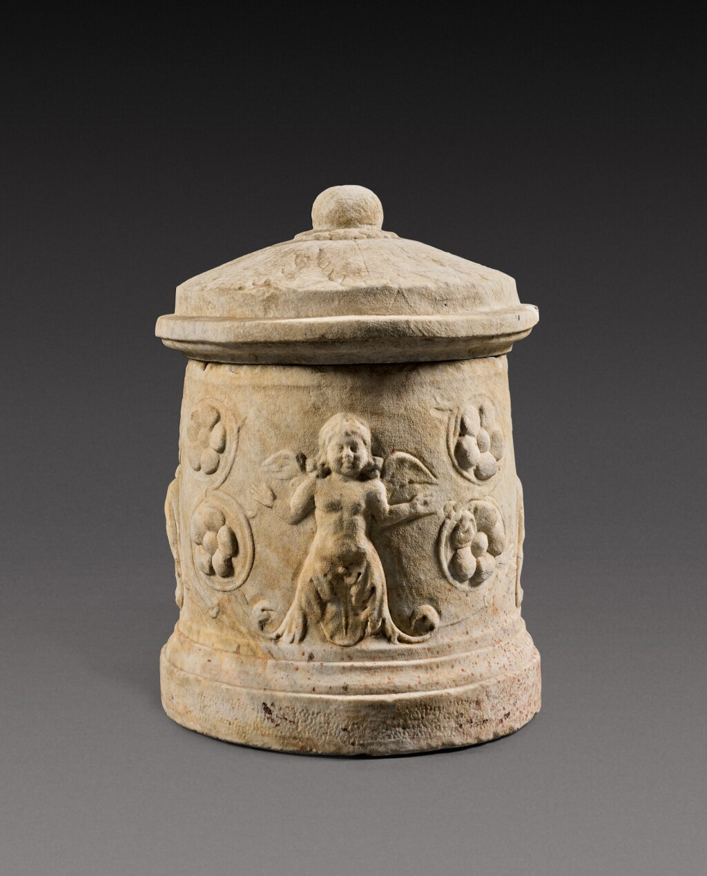 View full screen - View 1 of Lot 73. A Roman Marble Cinerary Urn and Lid, circa 1st Century A.D..