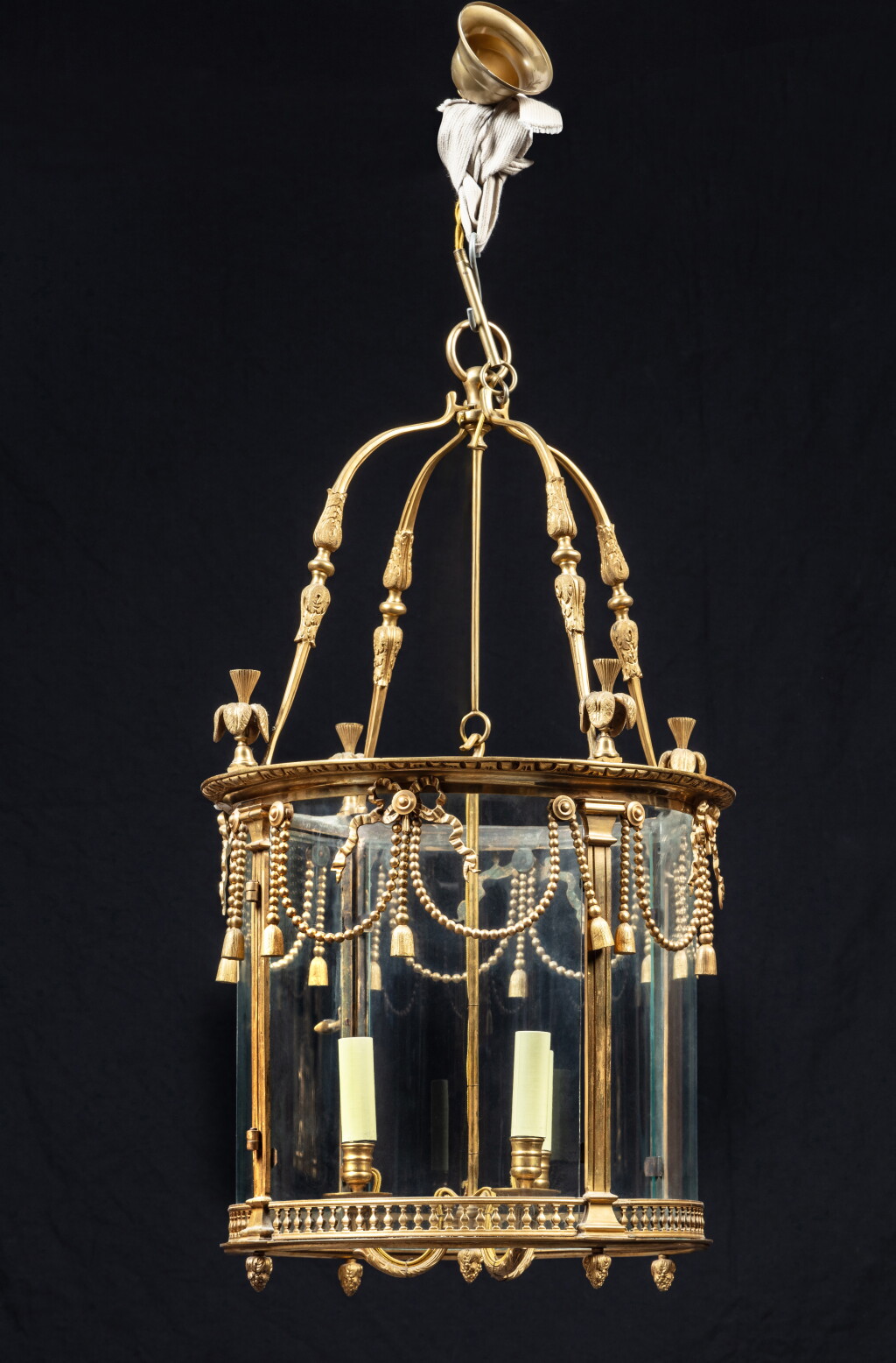 View full screen - View 1 of Lot 425. A Louis XVI style gilt-bronze three-light lantern, 19th century.