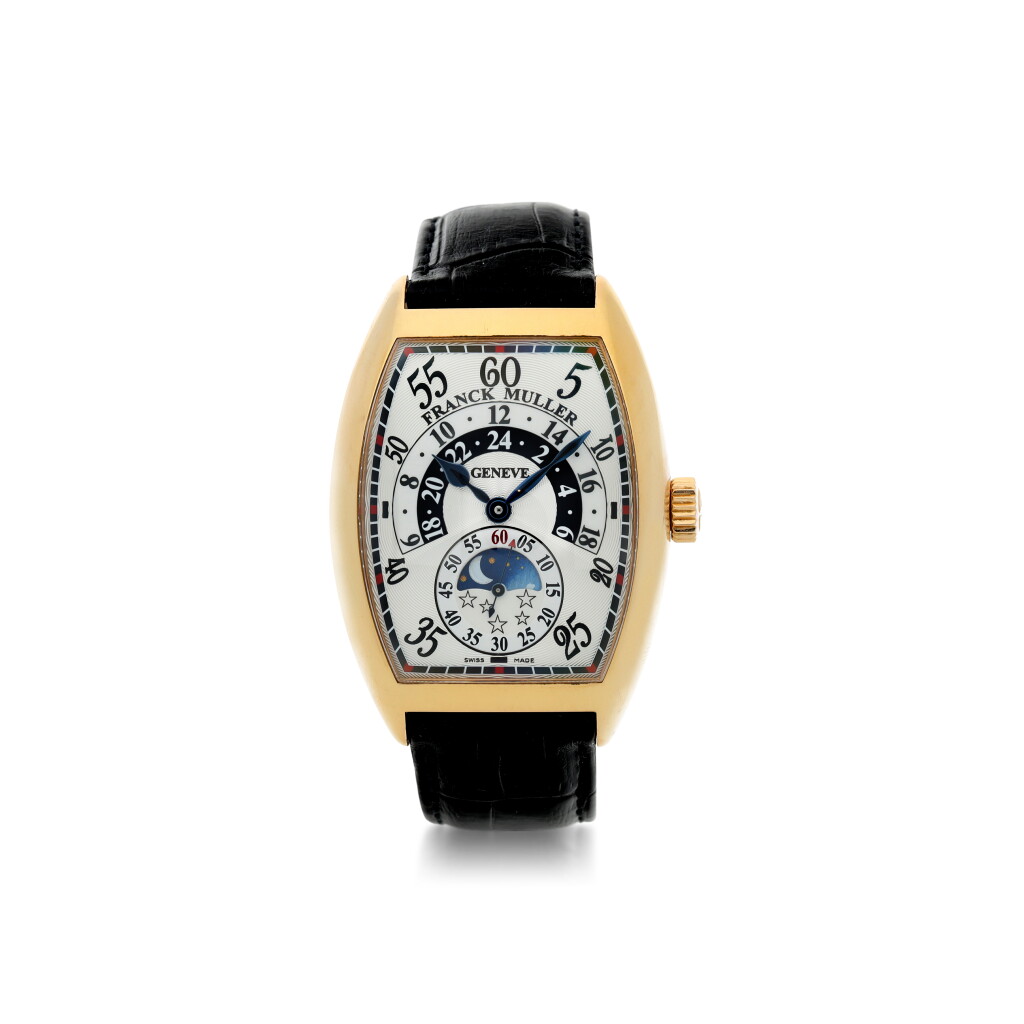View full screen - View 1 of Lot 802. FRANCK MULLER | REFERENCE 7880 HRJN, A PINK GOLD AUTOMATIC TONNEAU SHAPED WRISTWATCH WITH RETROGRADE HOURS AND MOON PHASES, CIRCA 2012.