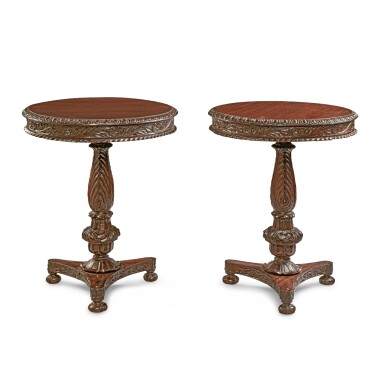 View full screen - View 1 of Lot 610. A Pair of Anglo-Indian Carved Rosewood Occasional Tables, 19th Century.