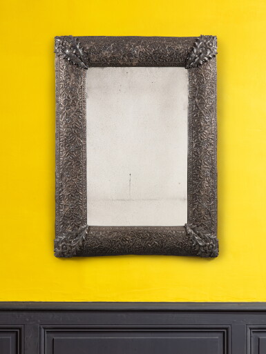 View full screen - View 1 of Lot 74. An Indian silver repoussé mirror, mid-19th century | Miroir en argent repoussé, Inde, milieu du XIXe siècle.