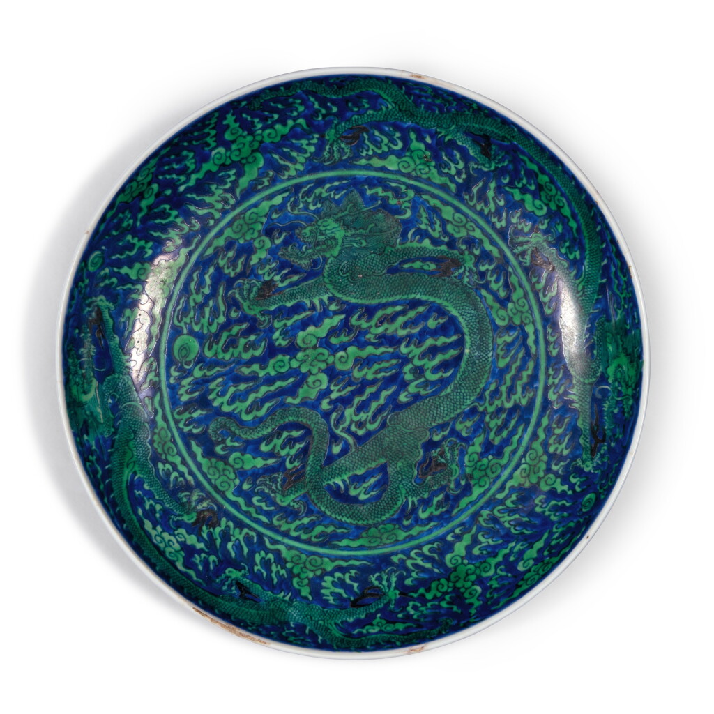 View full screen - View 1 of Lot 122. A blue-ground green-enameled ‘dragon’ dish, Mark and period of Kangxi | 清康熙 青花地綠彩趕珠雲龍紋盤 《大清康熙年製》款.