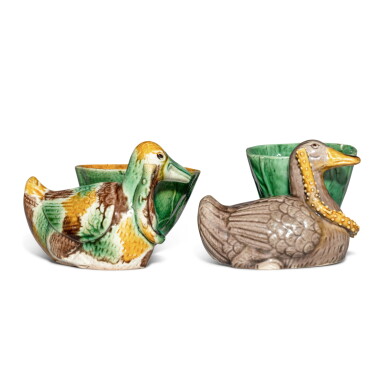View full screen - View 1 of Lot 604. Two famille-verte biscuit duck-and-lotus-form water droppers, Qing dynasty, Kangxi period | 清康熙 素三彩鴛鴦戲蓮式水盂一對.