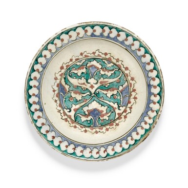 View full screen - View 1 of Lot 244. An Iznik polychrome pottery dish, Turkey, circa 1590.