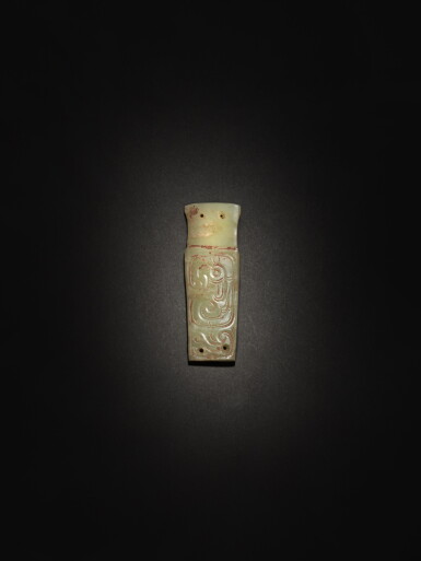View full screen - View 1 of Lot 257. An archaic celadon jade 'bird' pendant, Western Zhou dynasty | 西周 玉鳥紋飾.