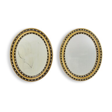 View full screen - View 1 of Lot 513. A Pair of Irish Giltwood Parcel Ebonized and Glass Mounted Mirrors, Second Half 19th Century.