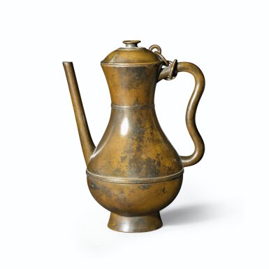View full screen - View 1 of Lot 391. An inscribed bronze ewer and cover, Seal mark and period of Qianlong, dated to the dingchou year of the Qianlong period (corresponding to 1757) | 清乾隆 銅弦紋執壺 《乾隆丁丑年製》《敬信齋祭器》款.