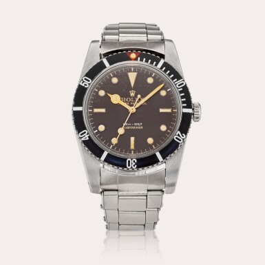 View full screen - View 1 of Lot 696. Reference 6536-1 Submariner | A stainless steel automatic wristwatch with bracelet, Circa 1955.