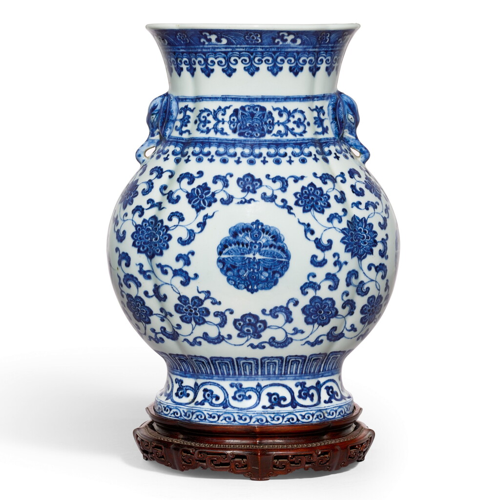 View full screen - View 1 of Lot 3601. A RARE LARGE BLUE AND WHITE 'FLOWER AND BUTTERFLY' QUATREFOIL VASE WITH ELEPHANT HANDLES SEAL MARK AND PERIOD OF QIANLONG | 清乾隆 青花花蝶紋海棠式象首瓶 《大清乾隆年製》款.