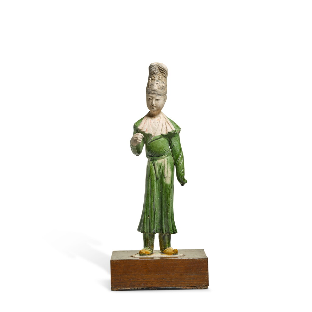 View full screen - View 1 of Lot 882. A green-glazed pottery figure of an official, Tang dynasty.