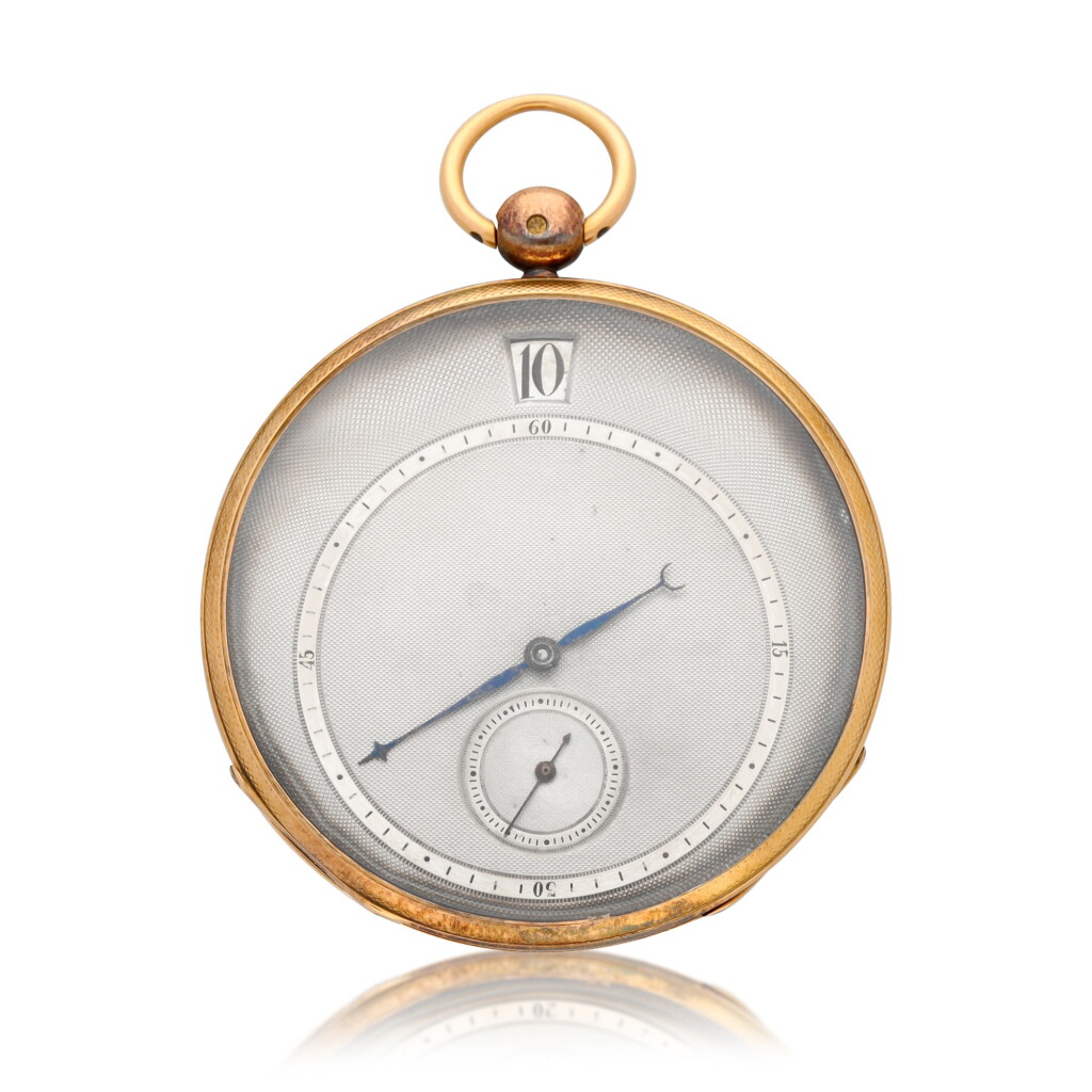 View full screen - View 1 of Lot 166. A gold open-faced jump hour cylinder watch Circa 1830, no. 1065.