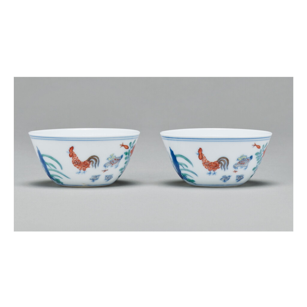 View full screen - View 1 of Lot 112. A PAIR OF DOUCAI 'CHICKEN' CUPS, QING DYNASTY, KANGXI PERIOD.