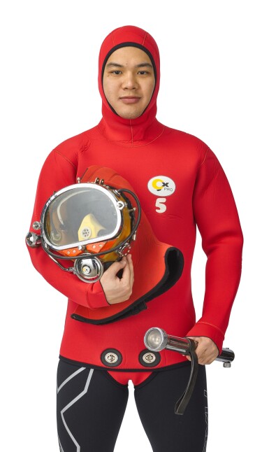 View full screen - View 1 of Lot 8141. COMEX | A VERY RARE SET OF DEEPSEA DIVING EQUIPMENT, CONSISTS OF A DIVING WET SUIT WITH INTEGRATED HOOD, CIRCA 1980; A COMEX INJECTION MOLDED DIVING MASK WITH IMPROVED FACE SEAL, CIRCA 1970; A HEAVY CHROME METAL DIVING FLASHLIGHT, CIRCA 1980 AND A YELLOW SAFETY LIGHT, CIRCA 1980.