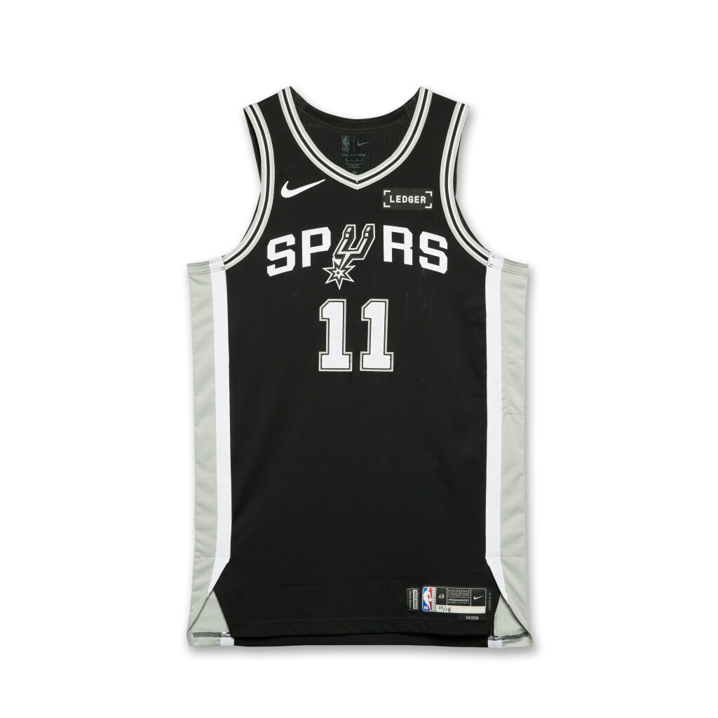 View full screen - View 1 of Lot 7. Carter Bryant San Antonio Spurs 2025-2026 Game Worn Icon Edition Jersey | 4th Career Game | 1st Career 3-Pointer.