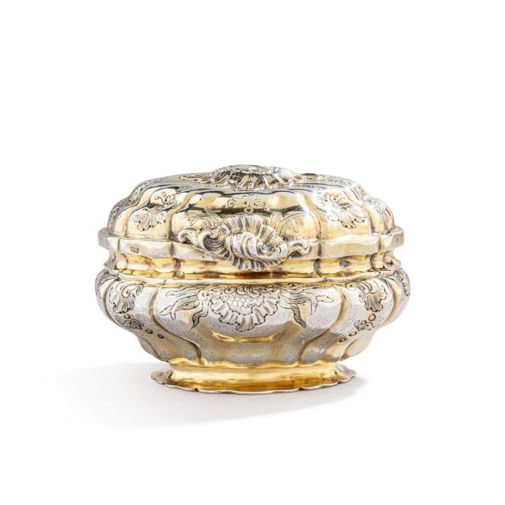View full screen - View 1 of Lot 821. A German silver-gilt toilet box, Augsburg, 1747-1749, maker’s mark partially legible.