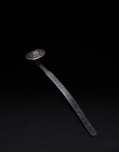 View full screen - View 1 of Lot 55. An inscribed gold and silver-inlaid iron ruyi sceptre, By Zhang Aochun, dated to the renxu year of the Tianqi reign (in accordance with 1622).
