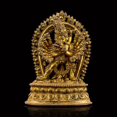 View full screen - View 1 of Lot 102. A rare gilt-copper alloy figure of Hevajra and Nairatmya Western Nepal, Khasa Malla or western Tibet, 13th - 14th century | 十三至十四世紀 尼泊爾西部卡薩馬拉王朝或藏西 鎏金銅喜金剛像.