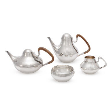View full screen - View 1 of Lot 192. A Danish Silver Four-Piece Tea and Coffee Set, No. 1017, Designed by Henning Koppel, Georg Jensen Silversmithy, Copenhagen, 1977.