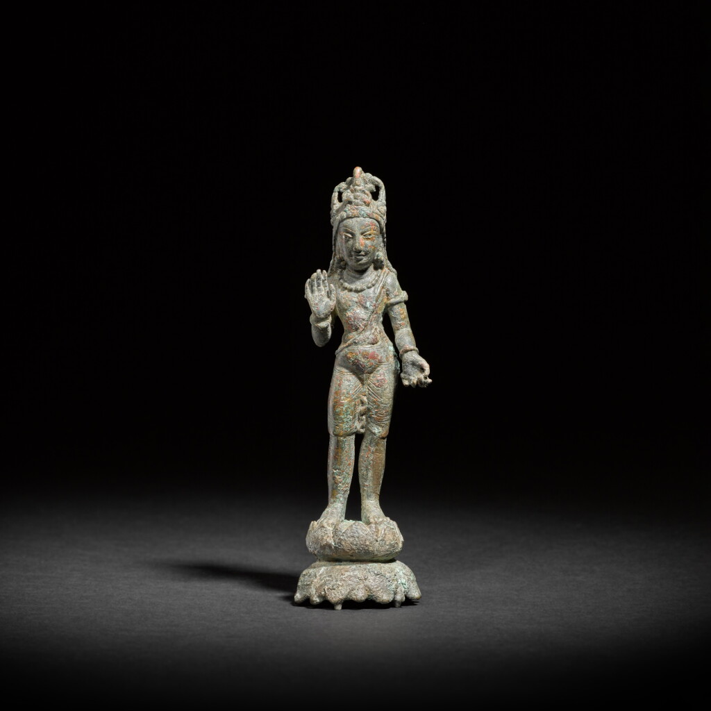 View full screen - View 1 of Lot 809. A silver-inlaid copper alloy figure of a bodhisattva, Swat Valley, circa 7th century.