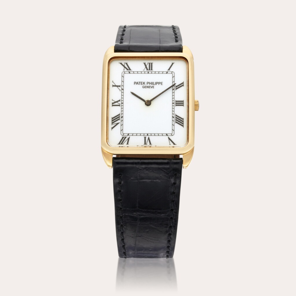 View full screen - View 1 of Lot 318. Reference 3803 | A yellow gold rectangular wristwatch, Made in 1985.
