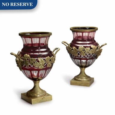 View full screen - View 1 of Lot 296. A PAIR OF NEOCLASSICAL BRASS MOUNTED, RUBY OVERLAY, AND CLEAR GLASS VASES, EARLY 20TH CENTURY.