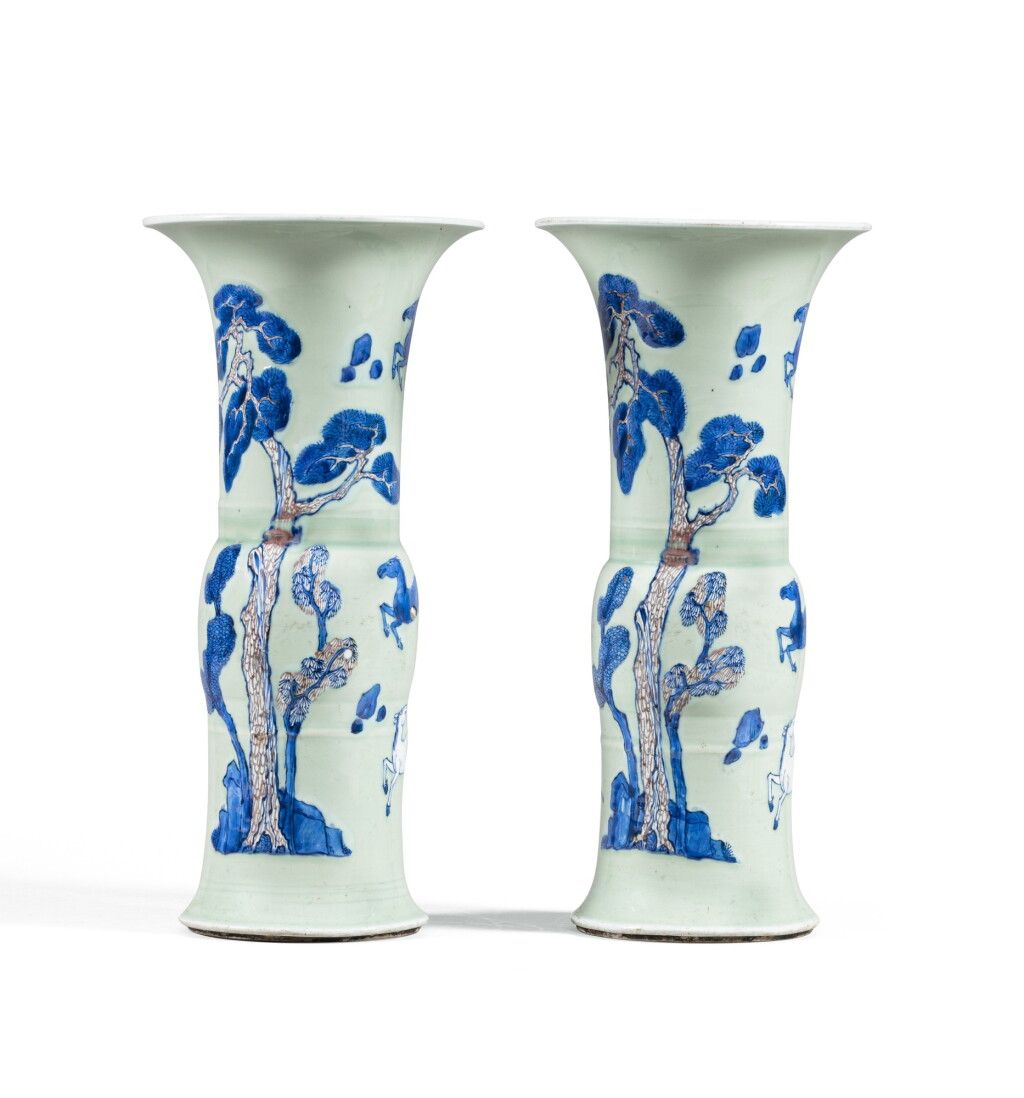 View full screen - View 1 of Lot 2. A pair of celadon ground underglaze blue and copper red beaker vases Qing dynasty, Kangxi period | 清康熙 粉青地青花釉裏紅駿馬圖花觚一對.