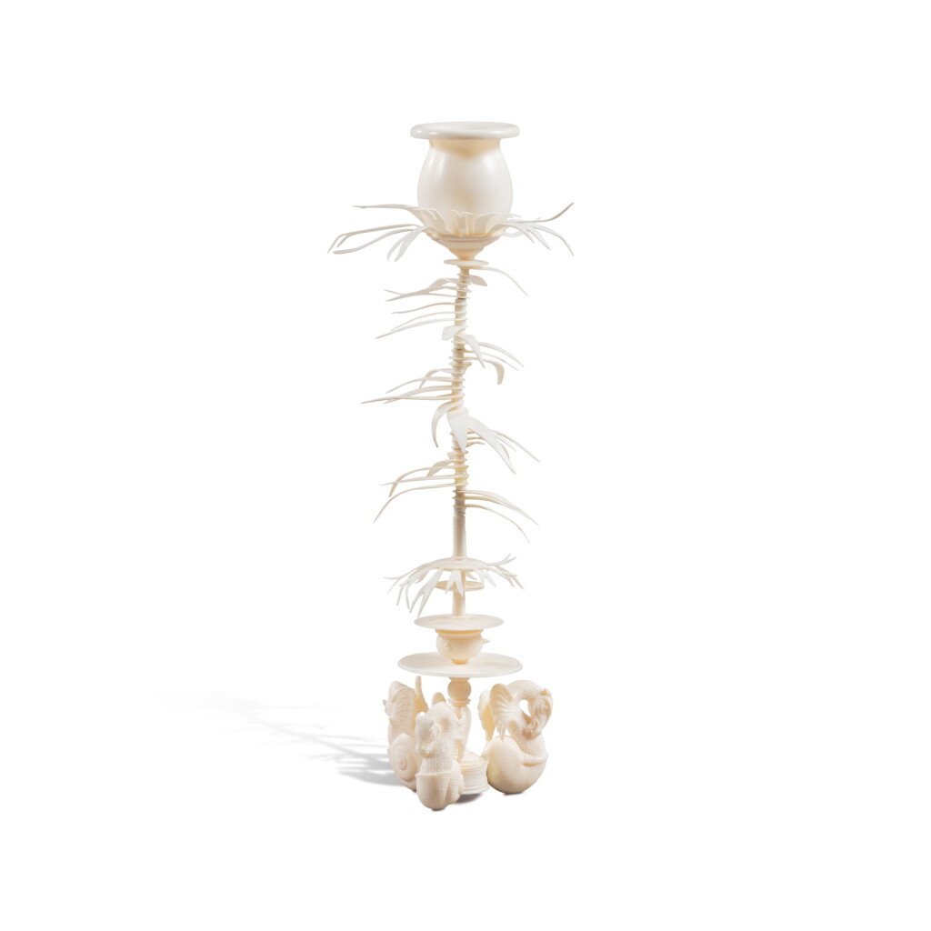 View full screen - View 1 of Lot 233. A carved ivory candelabra shaped as a palm tree, probably German, Circa 1800.
