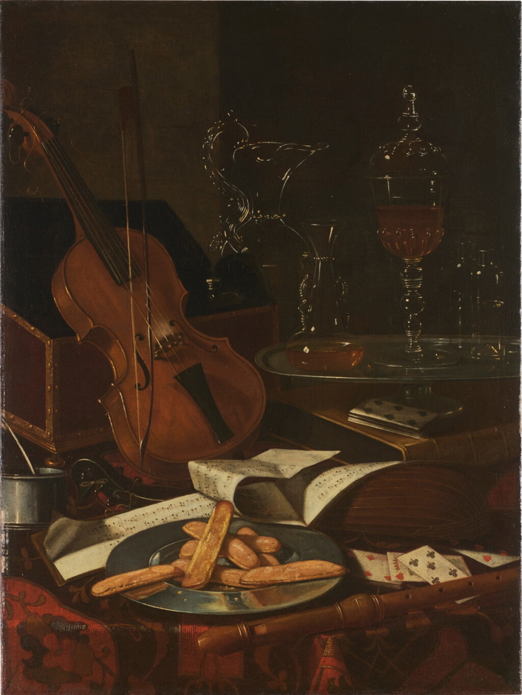 View full screen - View 1 of Lot 50. Still life of a violin, musical scores, playing cards, glass bottles and biscuits.