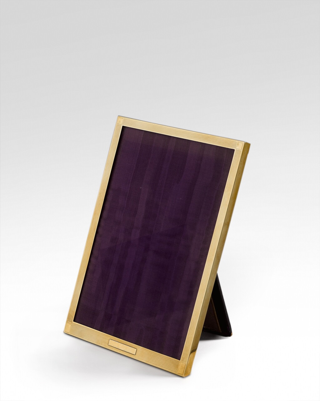 View full screen - View 1 of Lot 352. A 14ct gold rectangular photograph frame, Cartier, 20th century.