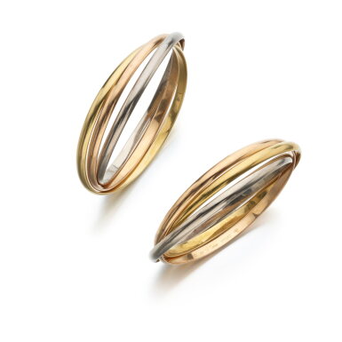 View full screen - View 1 of Lot 896. Pair of gold bangles, ‘Trinity’.