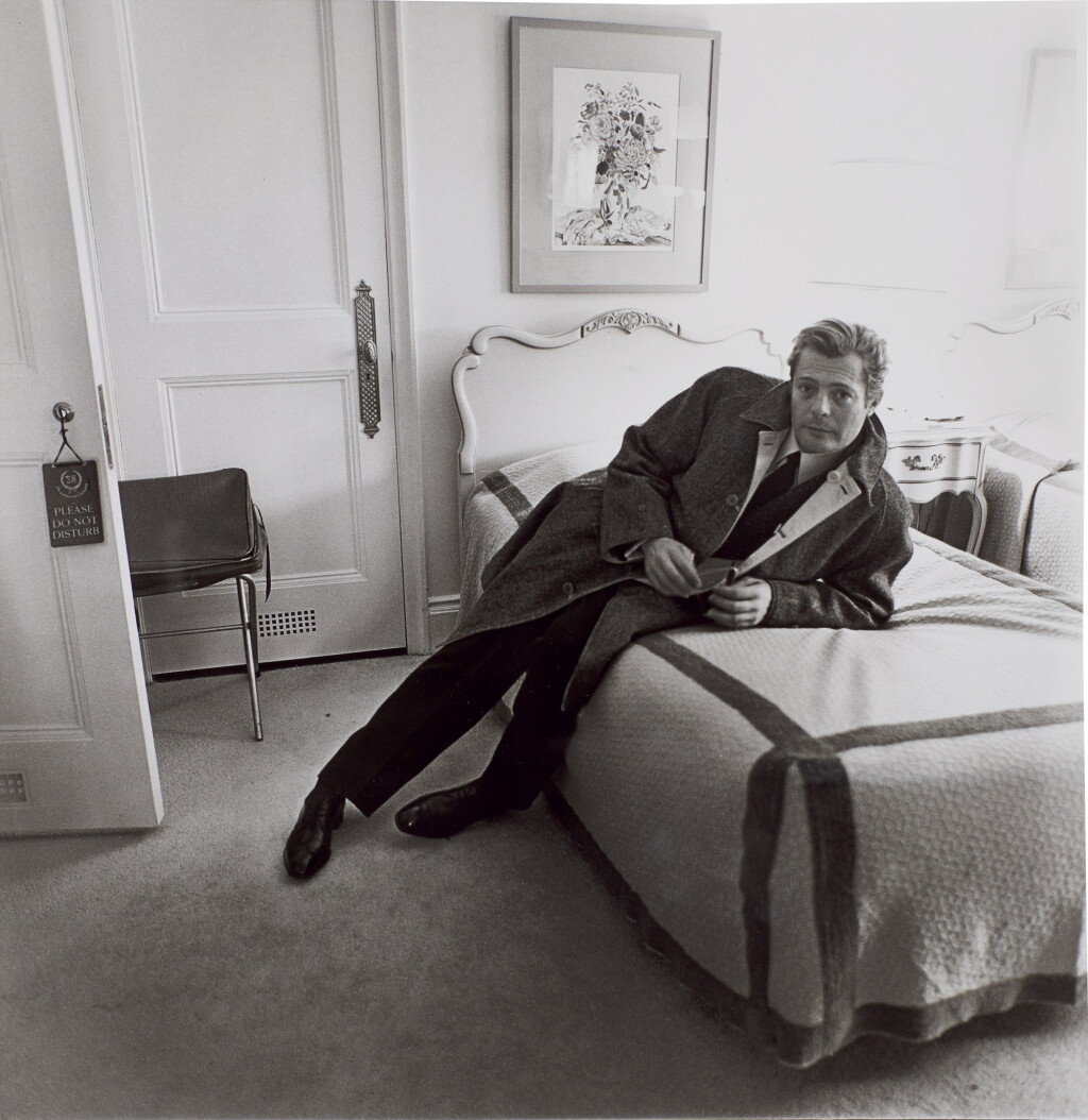 View full screen - View 1 of Lot 15. Marcello Mastroianni in his Hotel Room, NYC.