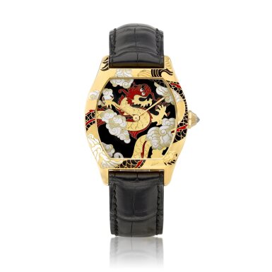 View full screen - View 1 of Lot 8701. Cartier d'art' Tortue, Reference 2496 | A limited edition yellow gold wristwatch with cloisonné enamel dial depicting a dragon, Circa 2004 | 卡地亞 | Cartier d'art' Tortue 型號2496 | 限量版黃金腕錶,備龍紋掐絲琺瑯錶盤,約2004年製.