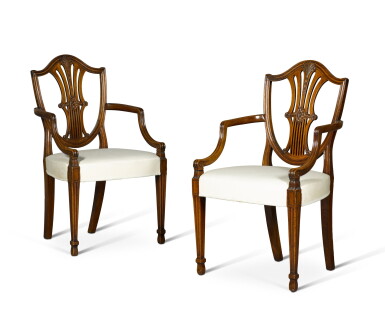 View full screen - View 1 of Lot 97. A pair of George III mahogany shield back armchairs, circa 1790.