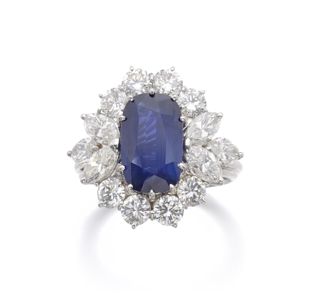 View full screen - View 1 of Lot 110. SAPPHIRE AND DIAMOND RING.